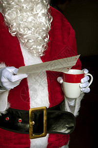 圣诞老人读信和喝咖啡图片
