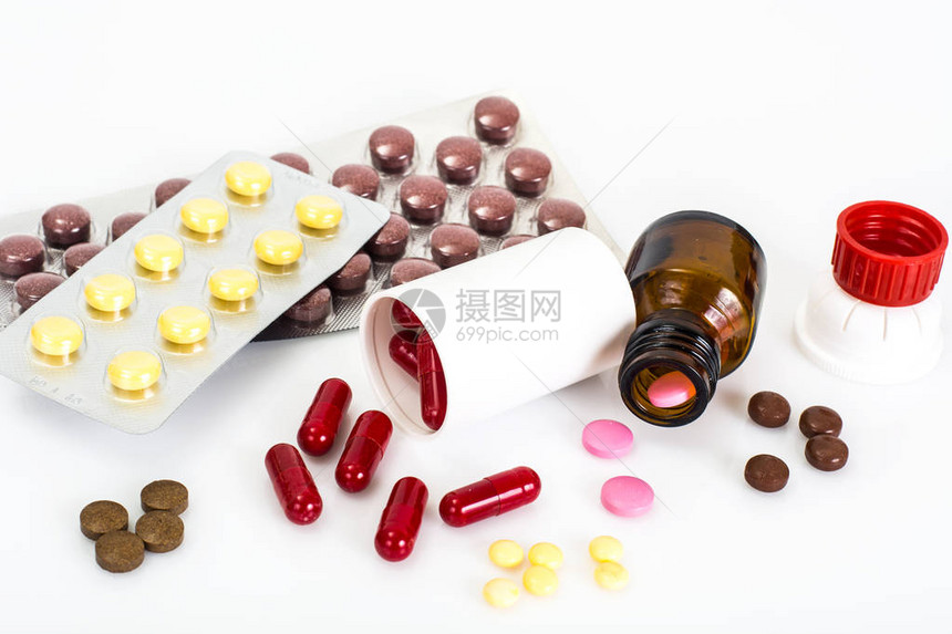 颜色药丸和医疗瓶工作室照片图片