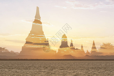 日落背景古老寺庙轮廓的抽象场景以图片