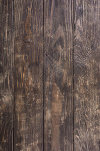 旧棕色木板的古龙形背图片