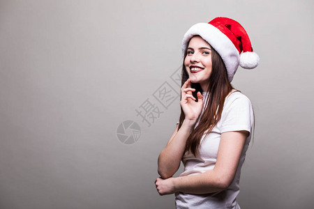 美丽的女模特戴圣诞帽图片