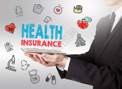 医疗保险概念健康的生活方式背景持有平板电脑的人图片