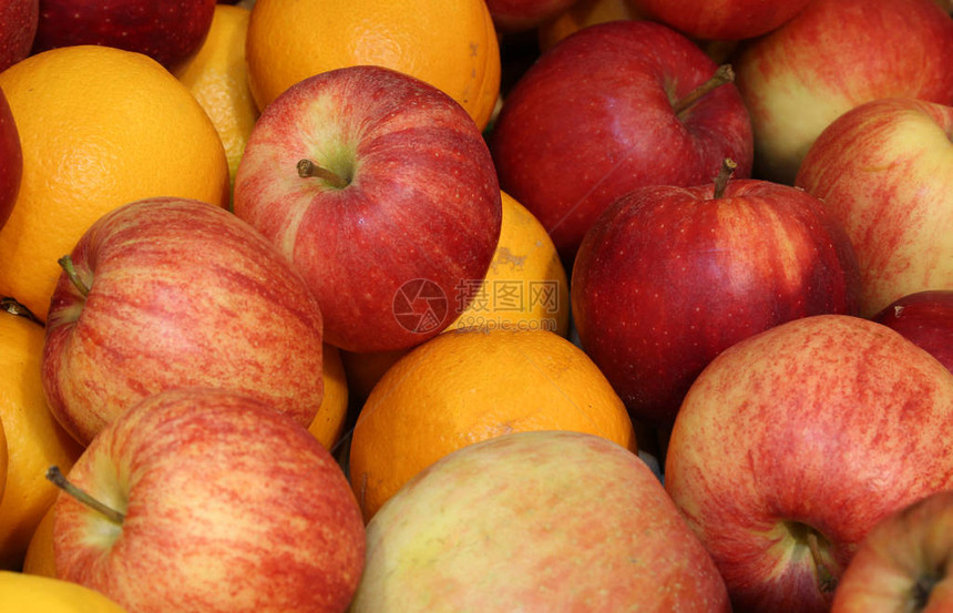 红苹果和橙子的背景图片