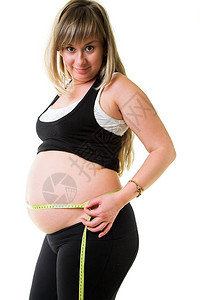 用黄带测量肚子的孕妇图片