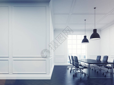 会议室内部有白色的墙壁长的会议桌图片