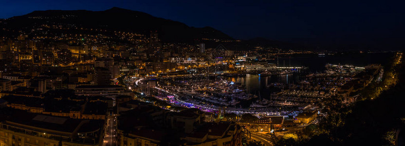 摩纳哥维尔和海克力士港的全景照片是晚上拍的从王子图片