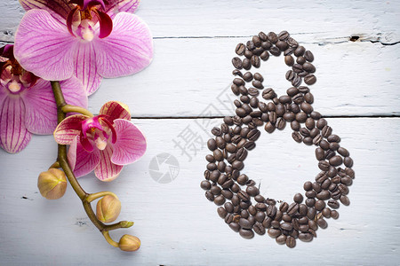 咖啡豆8号和兰花美景背国际妇女节图片