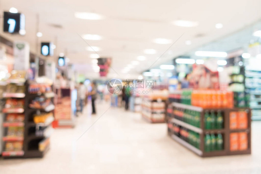 超市和百货商店内部背景的抽象模糊和散景图片