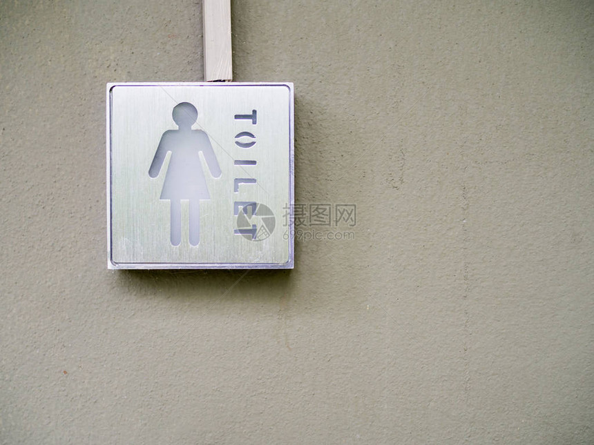 女厕所标志墙上的图片