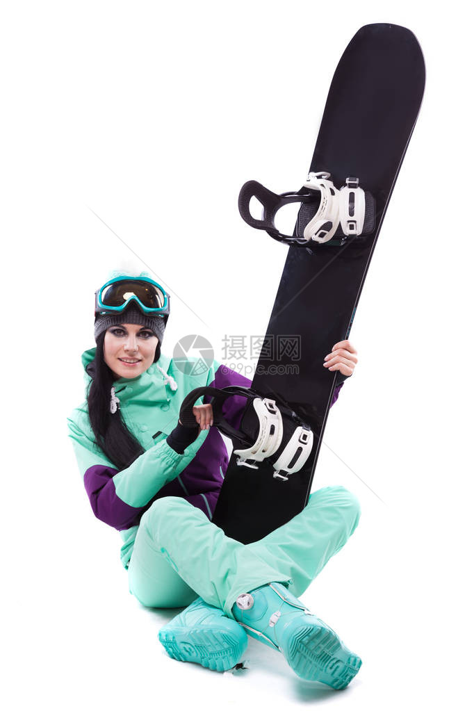 与身穿紫色滑雪服蓝色滑雪眼镜和蓝色裤子的白人迷人的白人女隔开图片