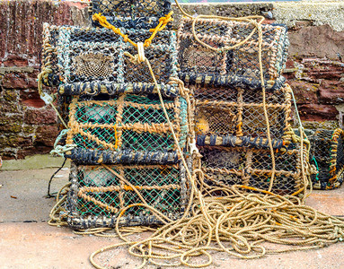 捕捞龙虾篮和螃蟹相互叠渔业捕鱼线渔图片