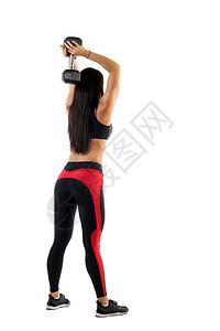 运动女健身模型用哑铃锻炼图片