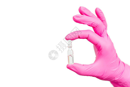 手持粉色手套薄膜和白底孤立的药物的女医生背景图片