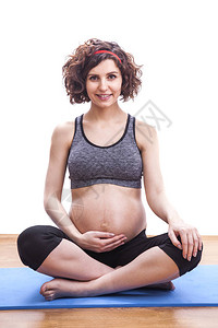 做瑜伽的年轻孕妇图片