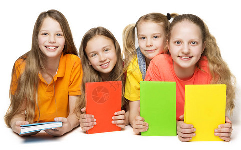 儿童书籍女青年团体持书女孩在白图片