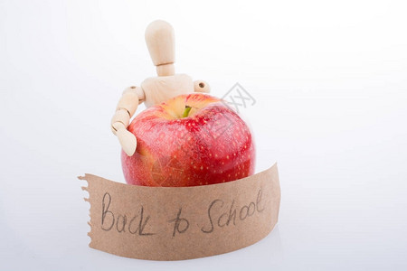 回到学校主题用一个红苹果图片
