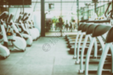健身设施中心健身房内部带运动训练设备的健身俱乐部背景图片