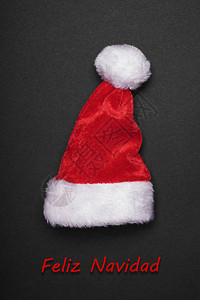 FelizNavidad西班牙圣诞贺卡与圣诞老人帽子背景图片