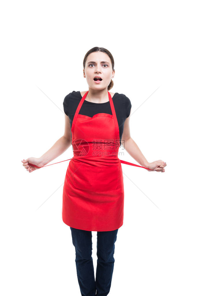 年轻女卖家系围裙去超市上班图片