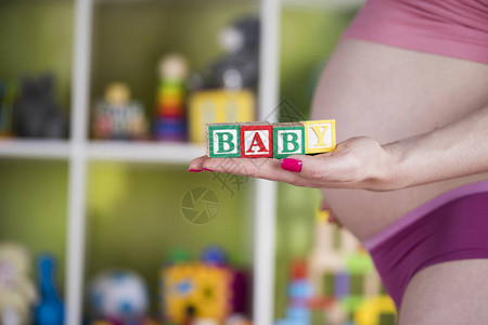 婴儿玩具快乐孕妇图片