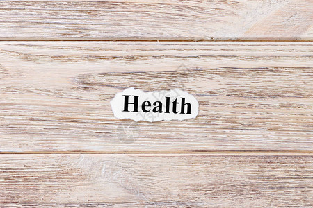 纸面上字词的健康概念木质背景上图片