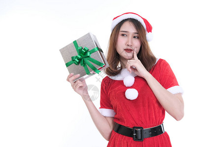 圣诞老人穿着白色上的亚洲女人的肖像礼品盒的女孩圣诞假期圣诞快乐图片