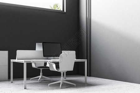 黑色墙办公室内有一张电脑桌子黑屏幕和一把白椅子背景图片