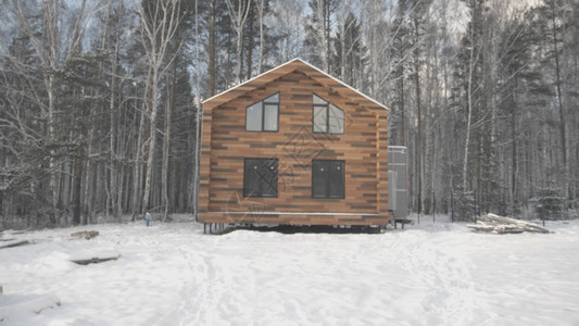 人类在冬季用平板电脑制作建筑摄影图片