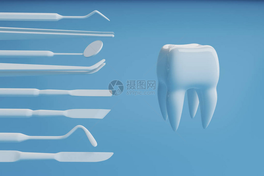 带有牙医工具的蓝色背景上的牙齿图像图片