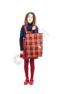 有一个孤立在白色背景上的红包的孩子小美容购物狂节日礼物图片