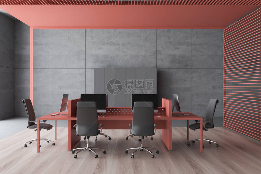 现代开放空间办公室的内部有灰色的墙壁木地板粉红色的电脑桌和灰色的橱柜图片