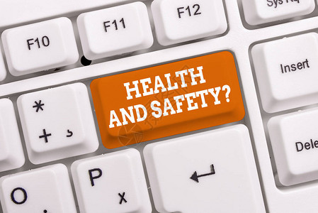 手写文本健康和安全问题防止事故或伤害的概念照片规定和程序白色pc键盘图片