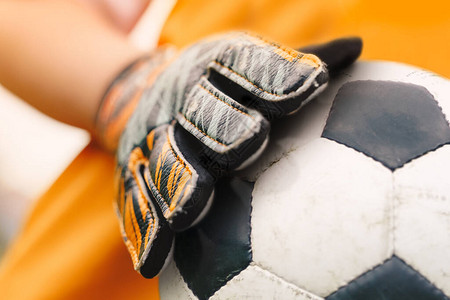足球背景细节图像紧靠足球和运动守门员手套足球守门图片