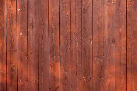 棕色木质垂直板栅栏图片