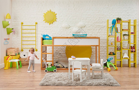 现代木制婴儿房儿童装饰楼梯和铺位桌子和儿童风格玩具白砖墙背景图片
