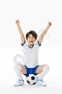 小足球运动员踢足球图片