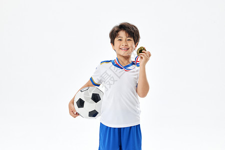 儿童得奖踢足球的小男孩获奖形象背景
