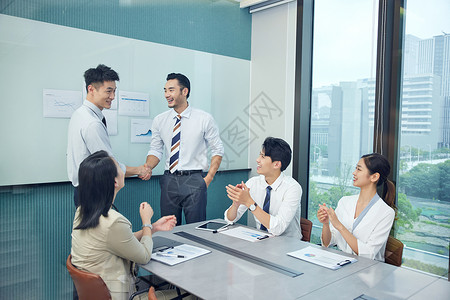 会议室开年终会议的商务团队背景图片