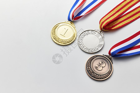 金属铜牌三枚奖牌背景