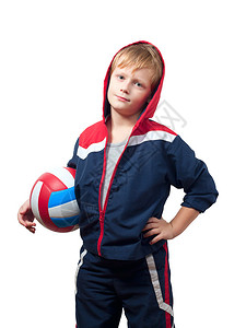 穿泳衣的小男孩拿着排球图片