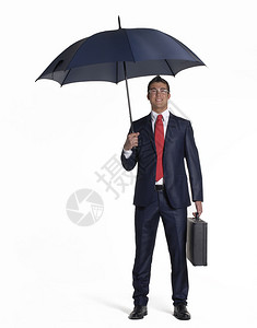 拿着雨伞的年轻商人图片