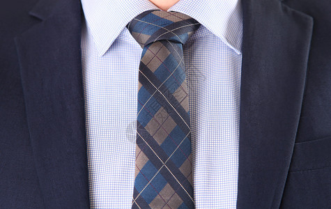 蓝色衬衫和领带的商人图片