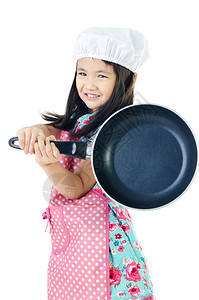 小亚洲女孩带着厨房杂物概念图片