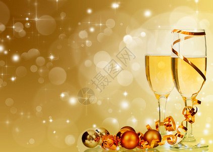 带香槟眼镜的眼镜和以闪亮的假日bokoh背景为标志图片
