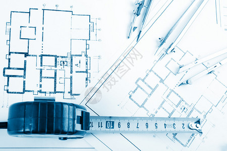 建筑项目蓝图蓝图卷和分隔罗盘卡尺计划中的折叠尺工程具从顶部查看复制空图片