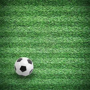 绿线球场上的足球或足球背景图片