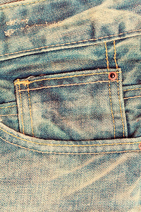 前口袋旧式设计师牛仔裤背景纹图片