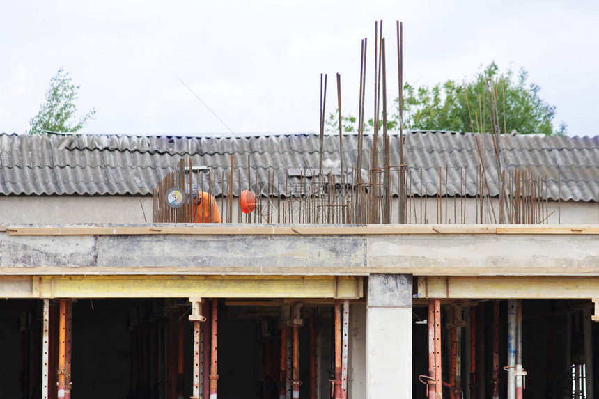 城市综合诊所建筑工地的工人图片