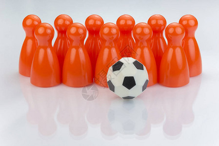 概念橙色游戏棋子作为足球图片