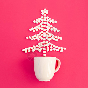 由棉花糖制成的圣诞树粉红色背景平整背景图片